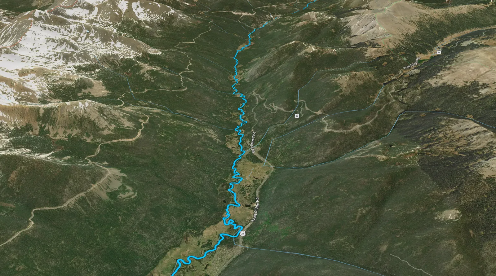 A selected river follows a winding mountain valley in Atlas, with nearby slopes, roads, and tributaries visible.