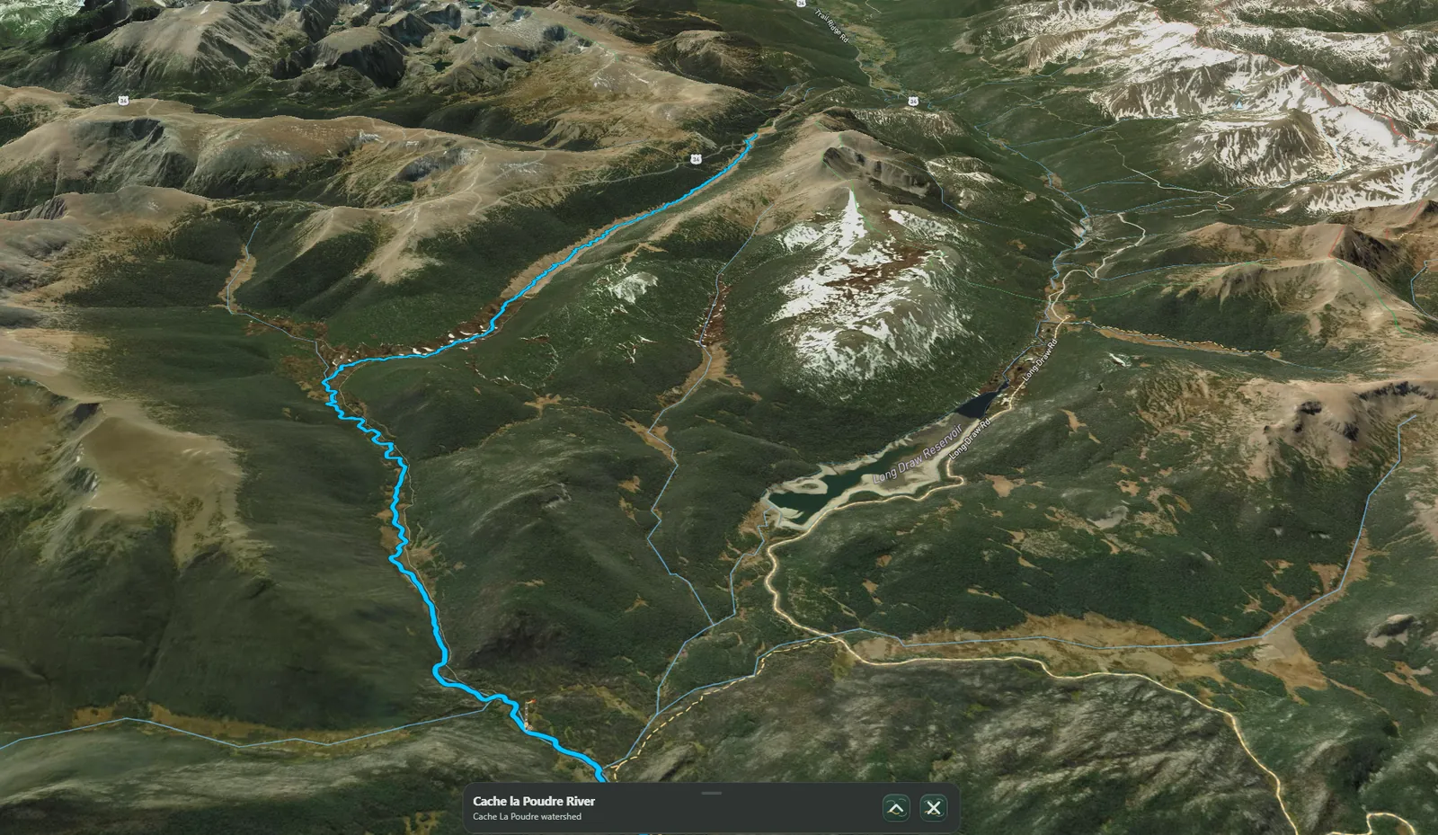 Cache la Poudre River selected in Atlas, winding through 3D mountain terrain above Long Draw Reservoir, with its water card collapsed.